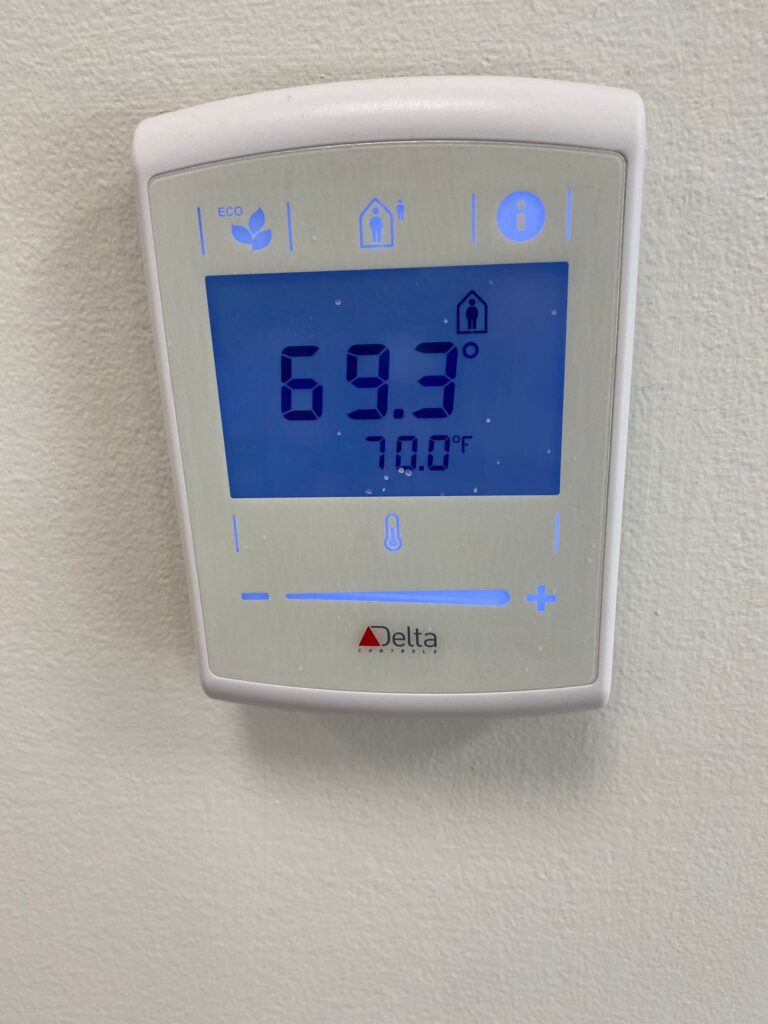 Thermostat installed on a wall